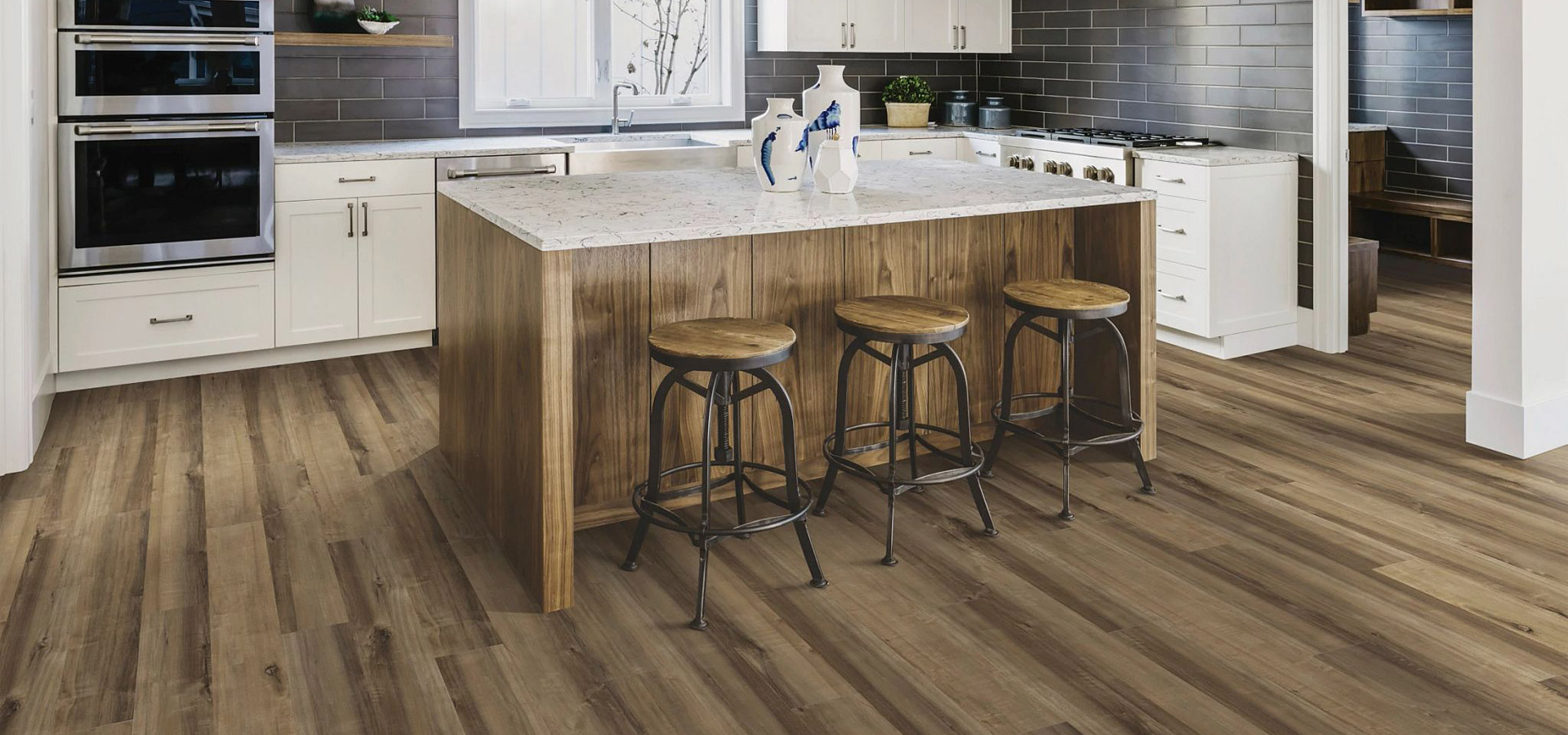 kitchen with brown hybrid vinyl flooring