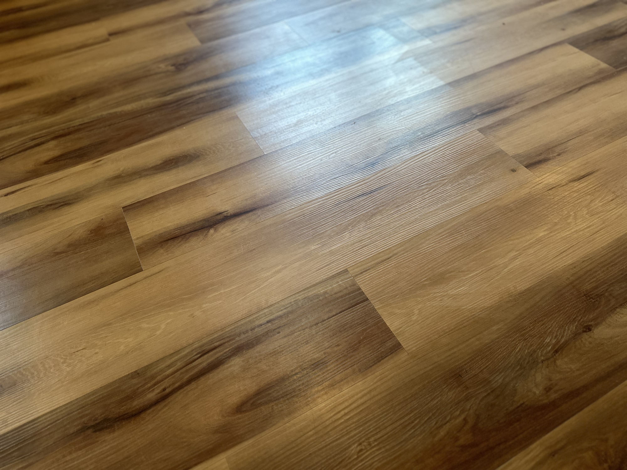 Luxury vinyl plank flooring installed on floor