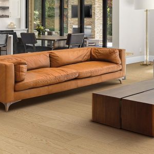 living room with tan laminate flooring